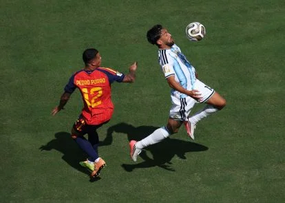 EAST RUTHERFORD, NEW JERSEY - JULY 19: Nico Gonzalez #15 of Argentina controls the ball against Pedro Porro #12 of Spain during the FIFA World Cup 2026 Final match between Spain and Argentina at New York New Jersey Stadium on July 19, 2026 in East Rutherford, New Jersey. (Photo by Kevin C. Cox/Getty Images)