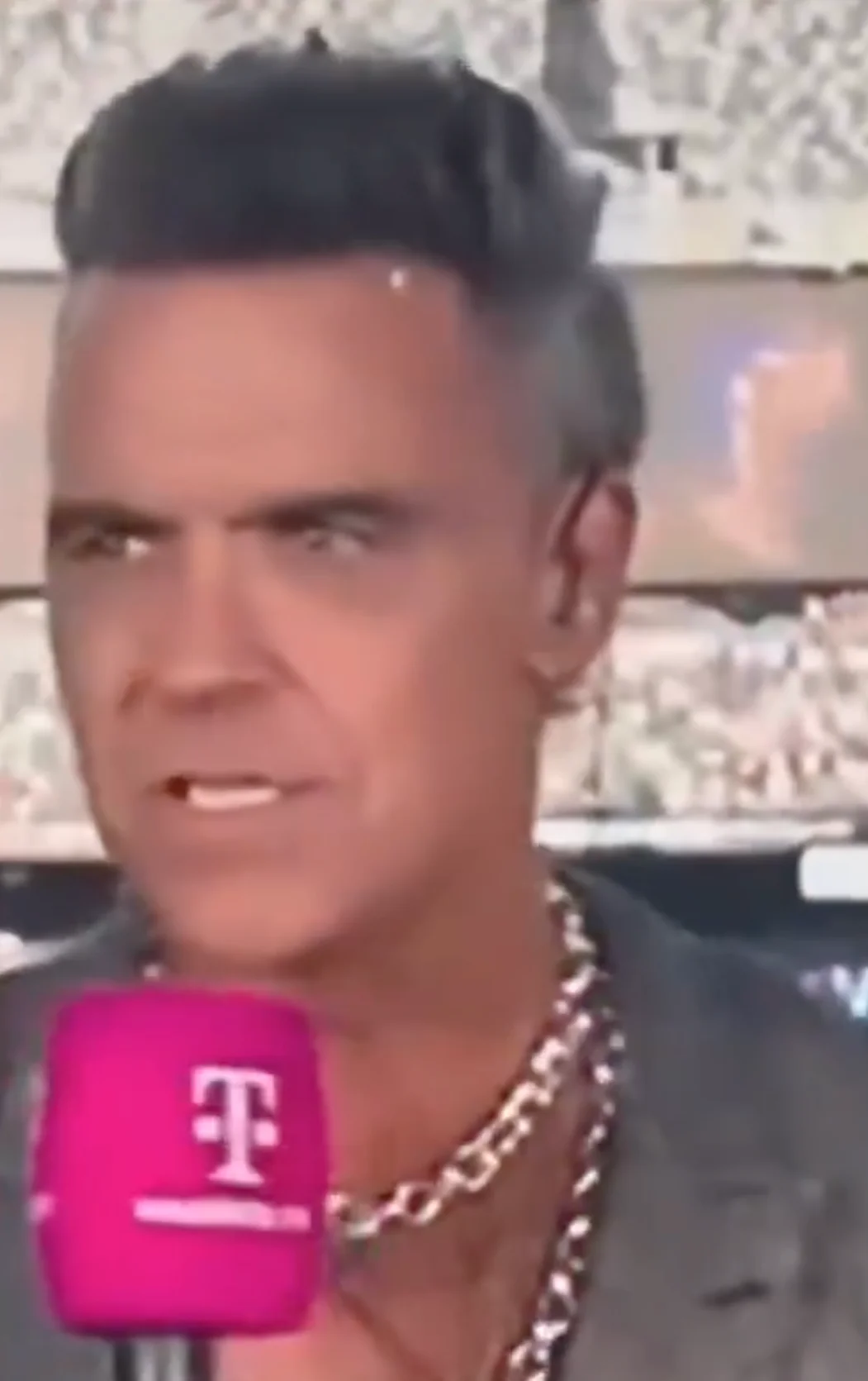 Williams stuck the object on his forehead after it dropped onto his microphone